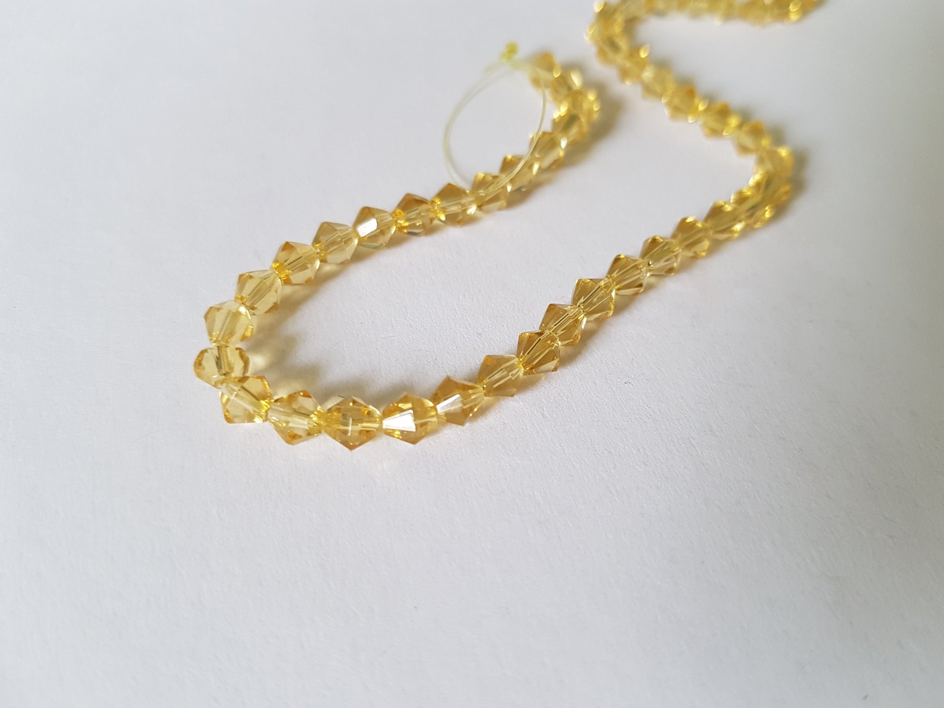 4mm glass bicone beads - yellow